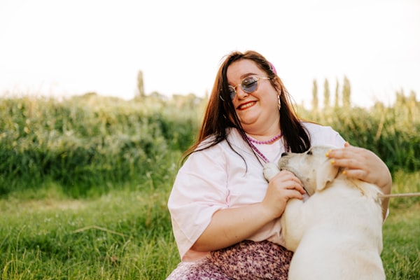 Smiling woman with her dog